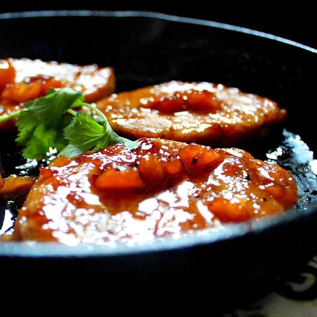 pan fried pork chops glazed with apricots and wine